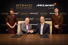 viation news.”
“Etihad Airways executive and McLaren Racing CEO pose during official partnership reveal – breaking aviation news.”